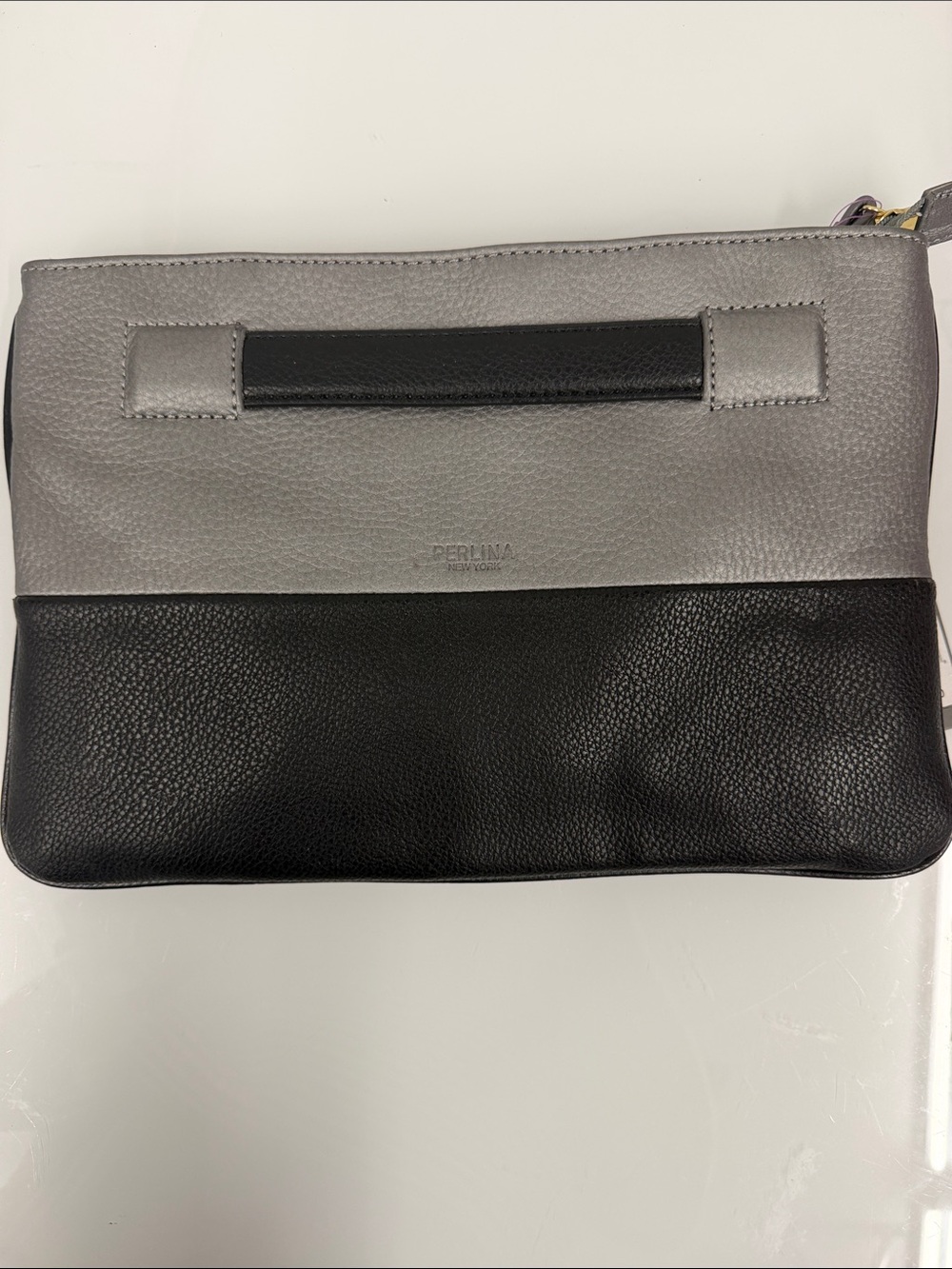 New flawed Perlina Two-Tone silver and Black Leather Wristlet clutch